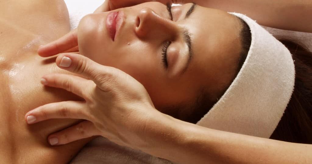 woman getting facial at a spa in Guelph, Ontario