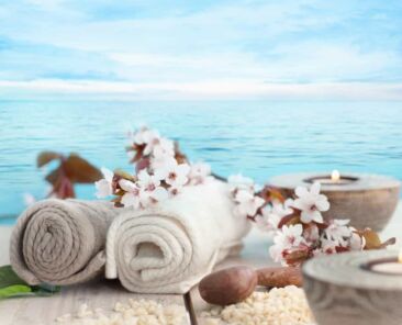 rolled towels and candles